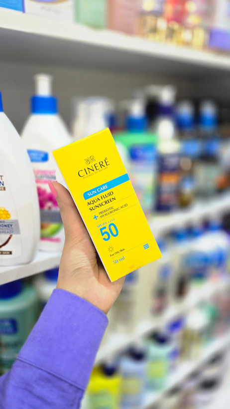 خرید کرم ضد آفتاب آکوا فلویید SPF 50 سینره برای پوست چرب با بستهبندی زرد | Cinere Aqua Fluid